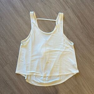 Onzie open back shirt, cream color, one size
